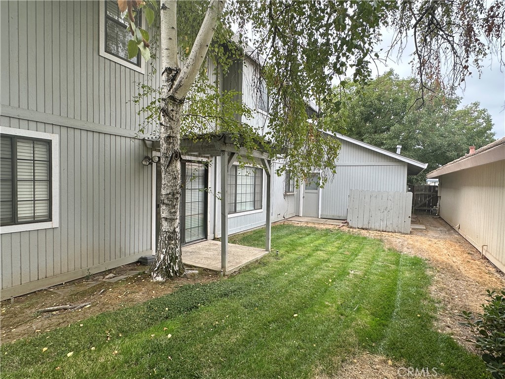 3072 Ironwood Court Merced, CA 95340 - Photo 22 of 25 a backyard of a house with lots of green space