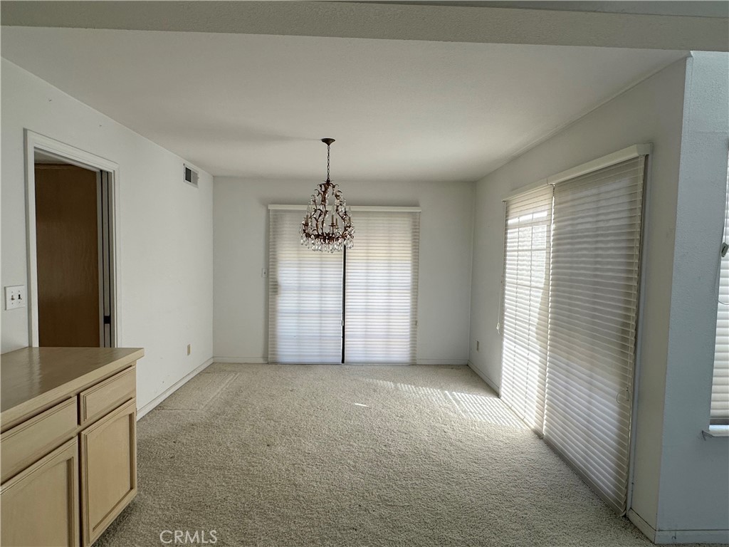 3072 Ironwood Court Merced, CA 95340 - Photo 4 of 25 a view of an empty room with a window