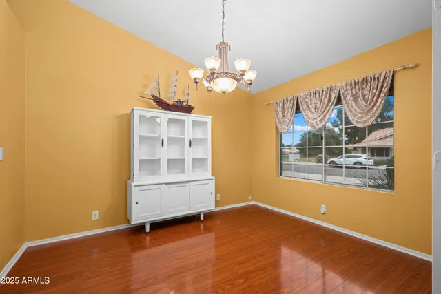a view of a livingroom with wooden floor