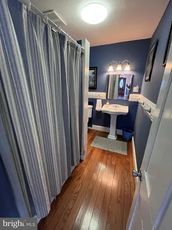 a view of a living room and dining room