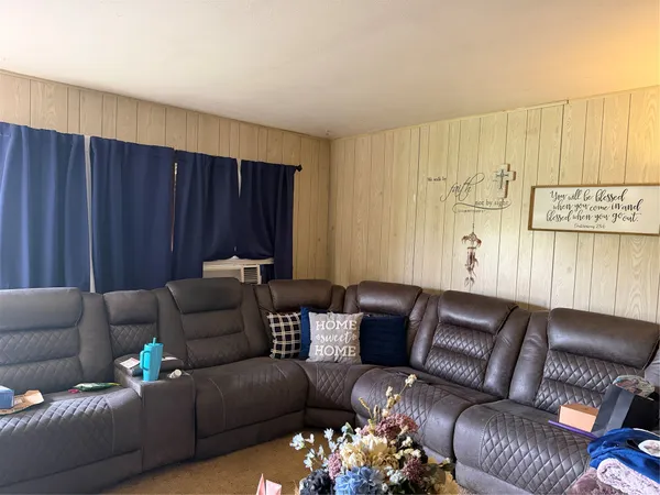 a work room with furniture and a couch