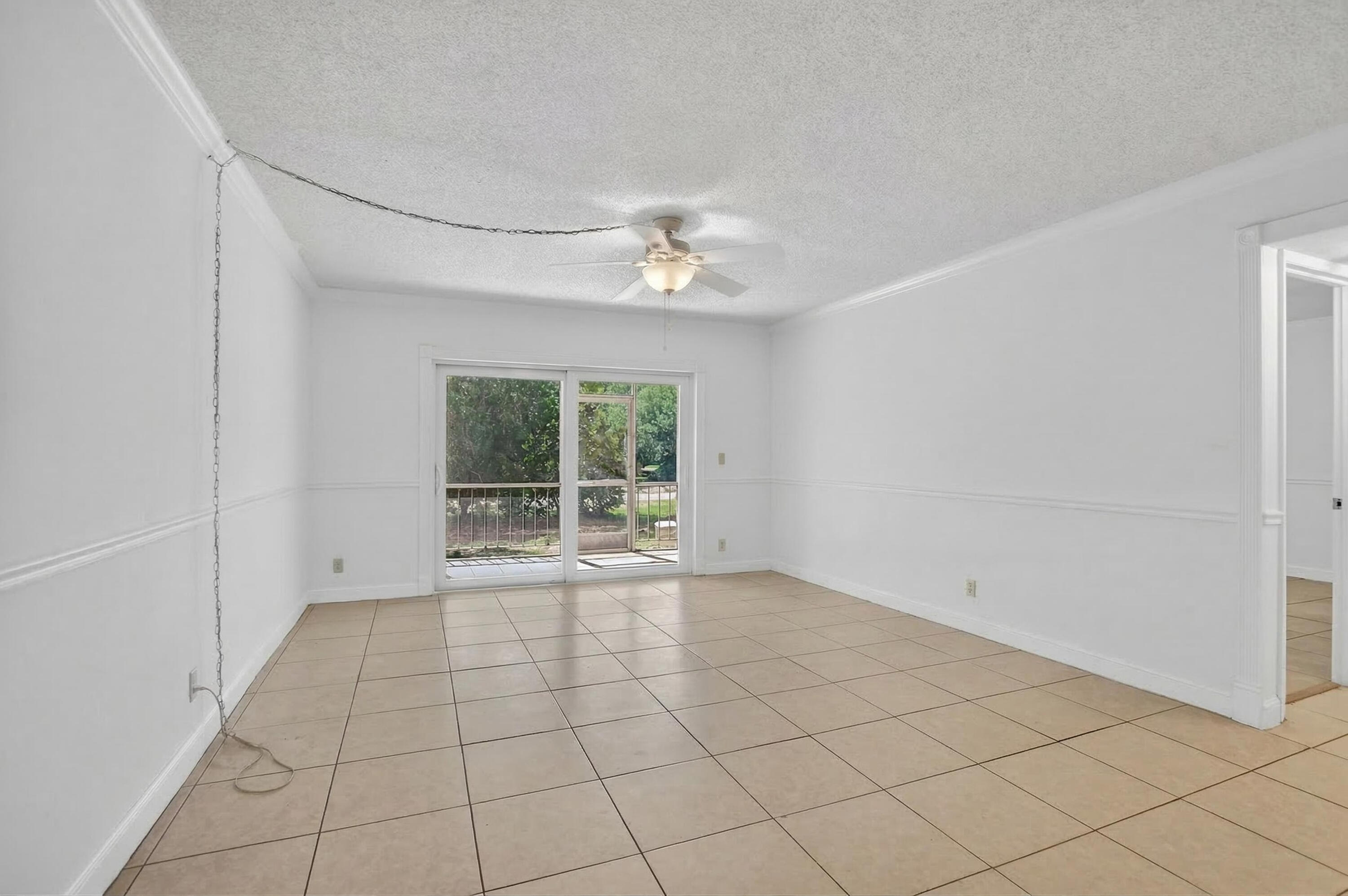 636 Northwest 13th Street, Unit 110 Boca Raton, FL 33486 - Photo 14 of 35 a view of an empty room with a window