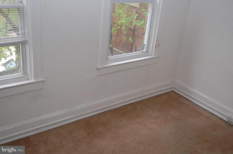 57 Todd Place Northeast Washington, DC 20002 - Photo 14 of 15 an empty room with a window