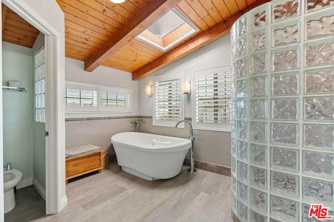 3941 Sunset Lane Oxnard, CA 93035 - Photo 12 of 24 a spacious bathroom with a double vanity sink and a bathtub