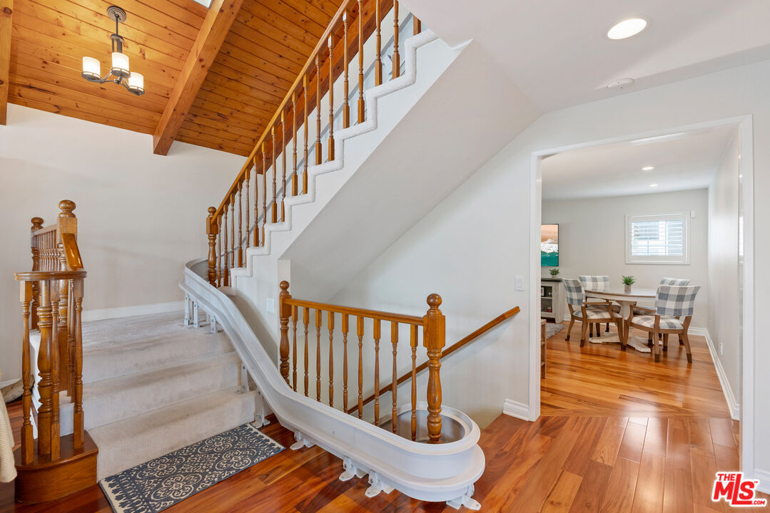 3941 Sunset Lane Oxnard, CA 93035 - Photo 17 of 24 a view of entryway dining room and hall with wooden floor