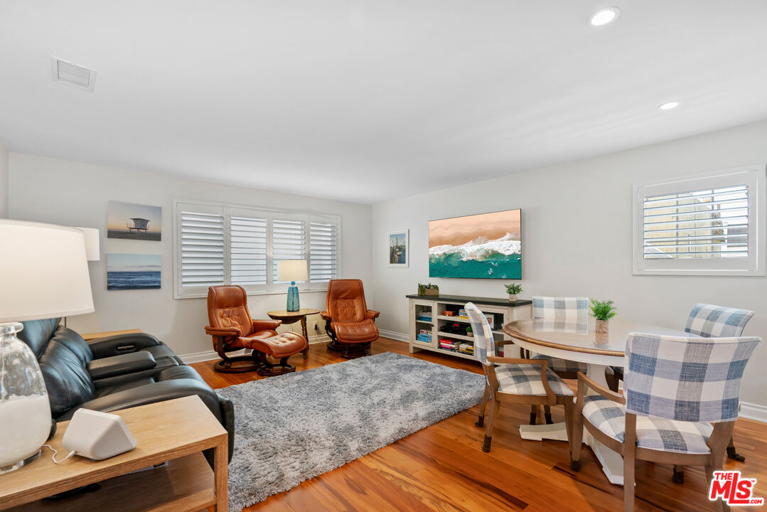 3941 Sunset Lane Oxnard, CA 93035 - Photo 18 of 24 a living room with furniture and a flat screen tv