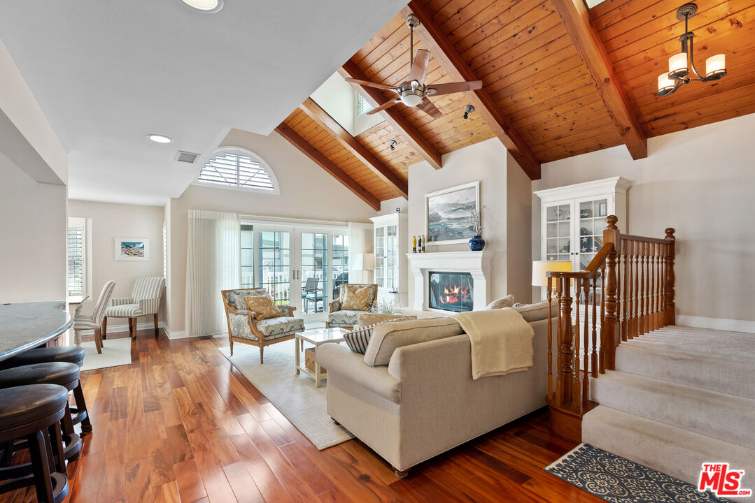3941 Sunset Lane Oxnard, CA 93035 - Photo 3 of 24 a living room with furniture fireplace and a large window