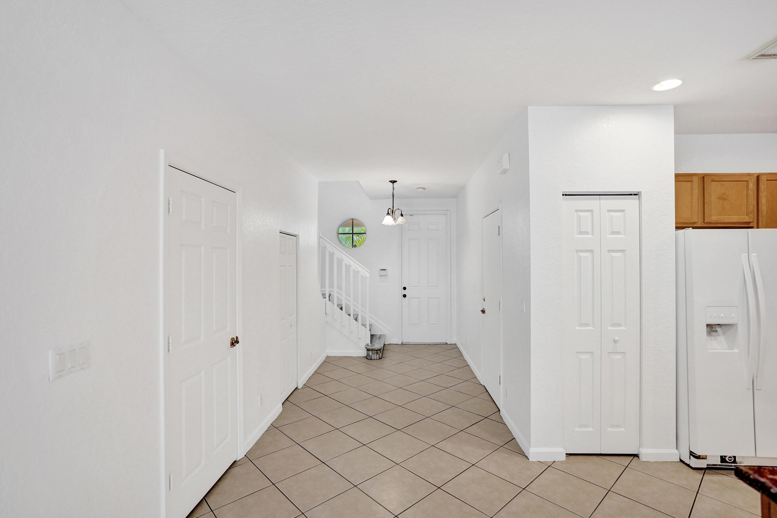 3072 North Evergreen Circle Boynton Beach, FL 33426 - Photo 20 of 55 a view of a bathroom with a sink and mirror