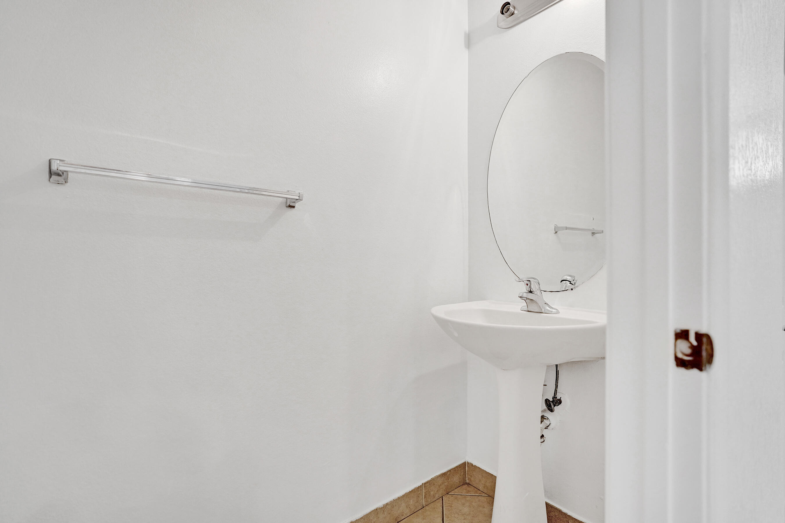 3072 North Evergreen Circle Boynton Beach, FL 33426 - Photo 22 of 55 a bathroom with a sink a mirror and shower view