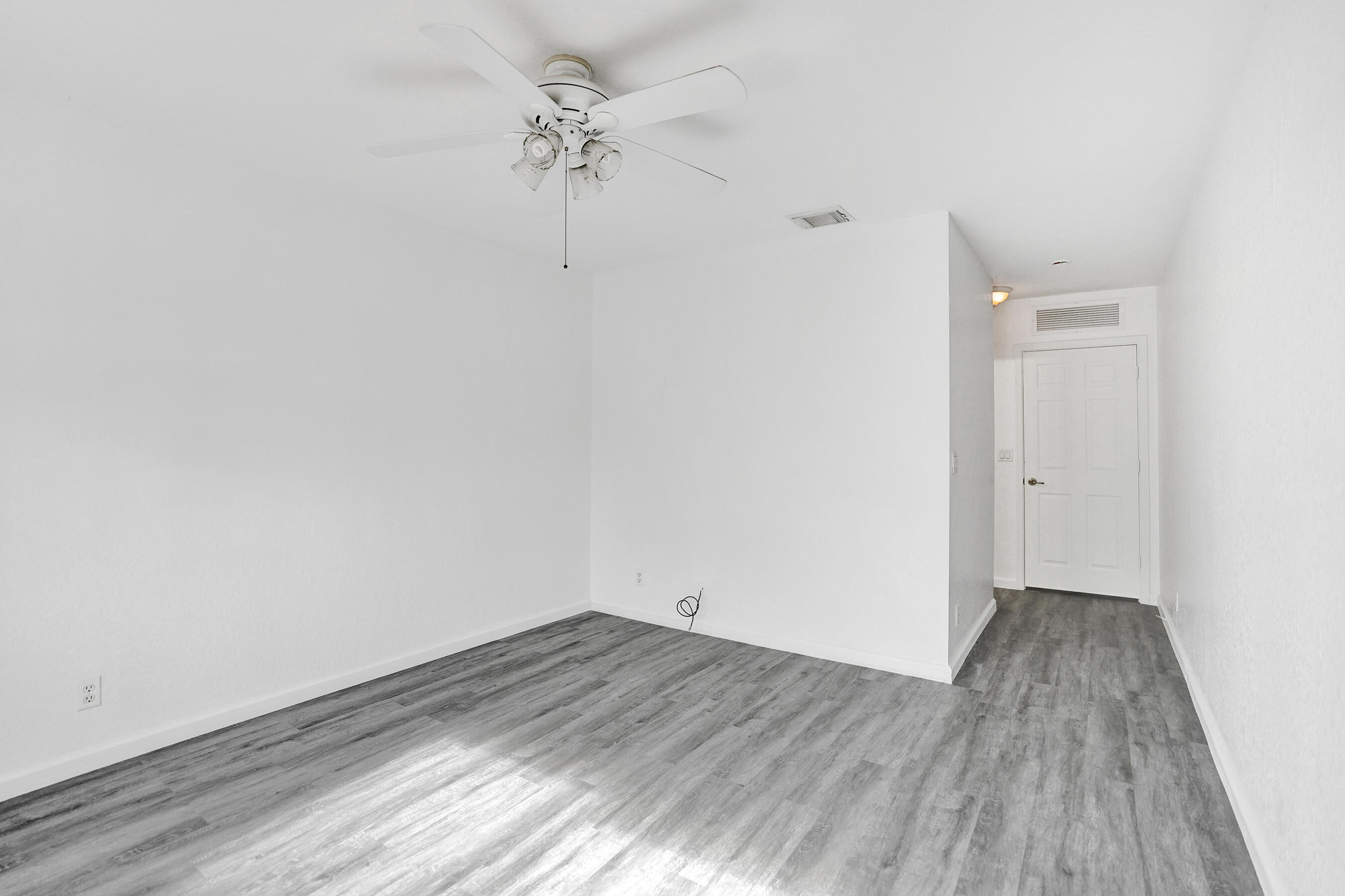3072 North Evergreen Circle Boynton Beach, FL 33426 - Photo 48 of 55 wooden floor in an empty room
