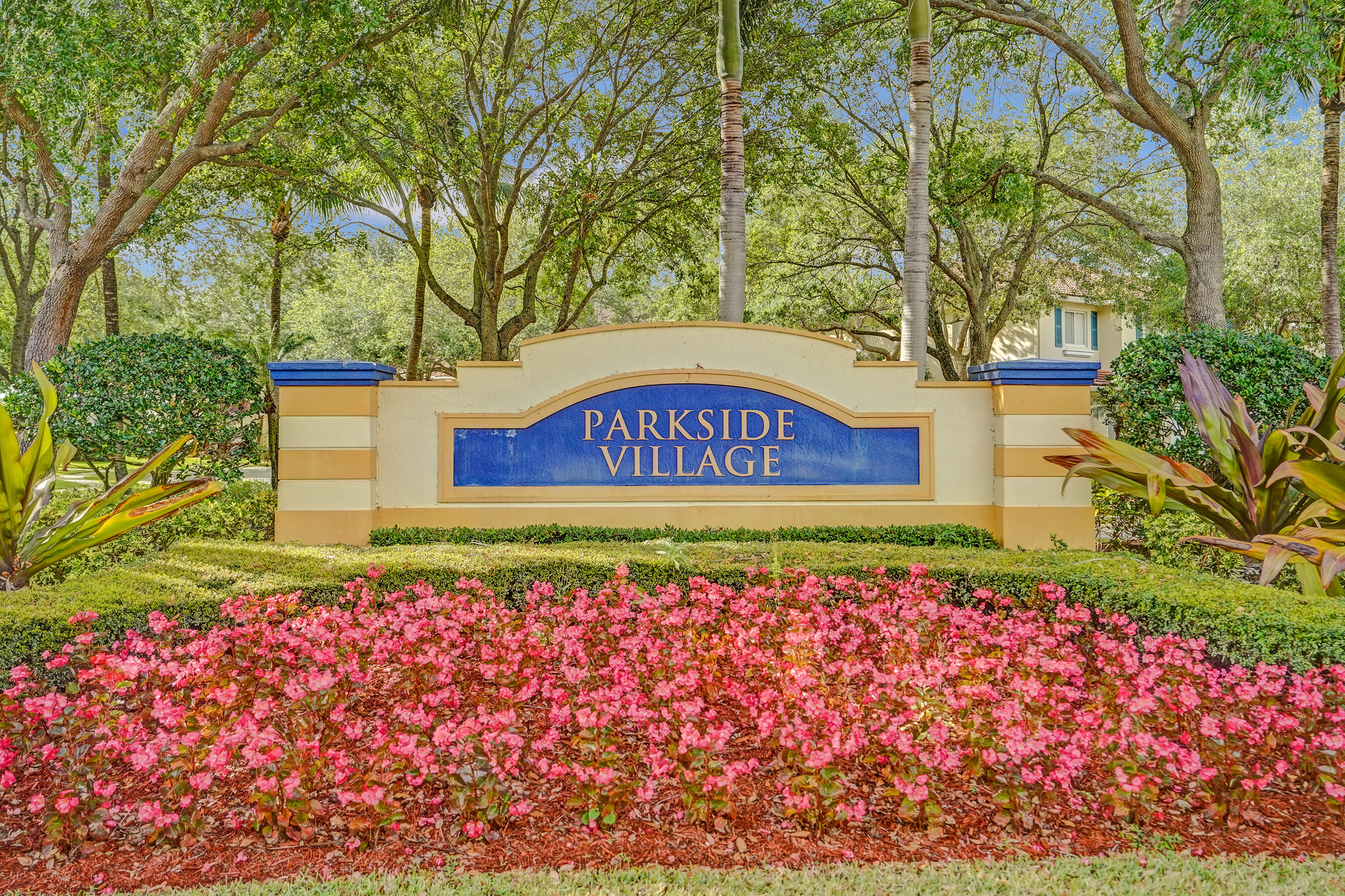 3072 North Evergreen Circle Boynton Beach, FL 33426 - Photo 54 of 55 a sign that is next to a tree