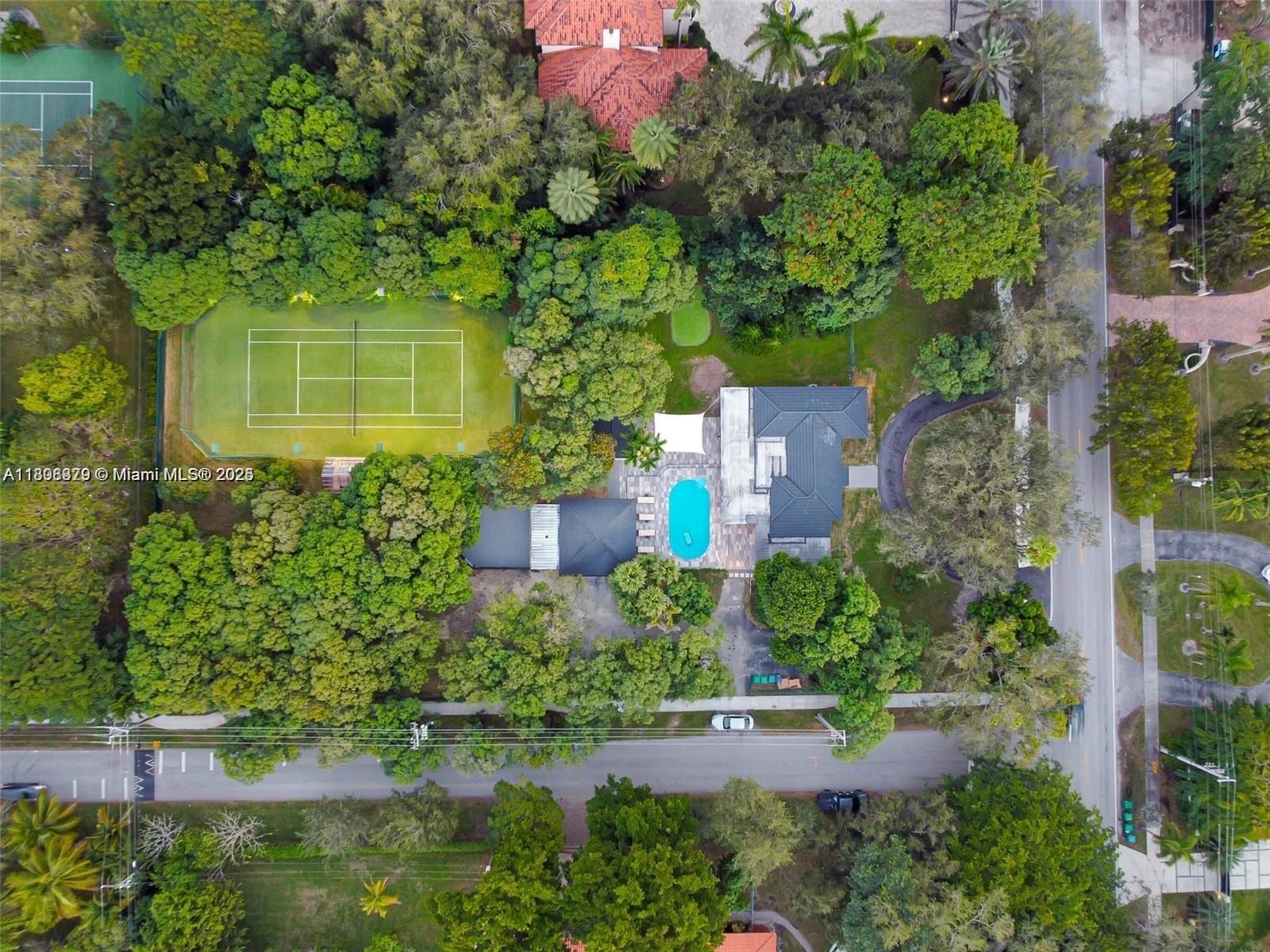 7335 Southwest 104th Street Pinecrest, FL 33156 - Photo 34 of 36 an aerial view of a house
