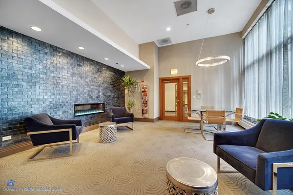 a group of people sitting in a living room