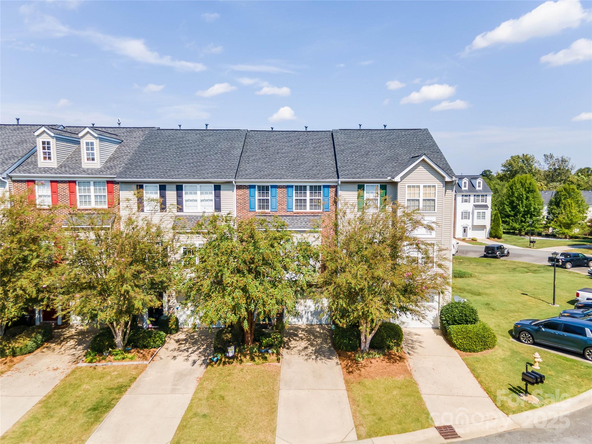 308 Rock Ridge Lane Mount Holly, NC 28120 - Photo 1 of 36 a view of a house with a garden and yard