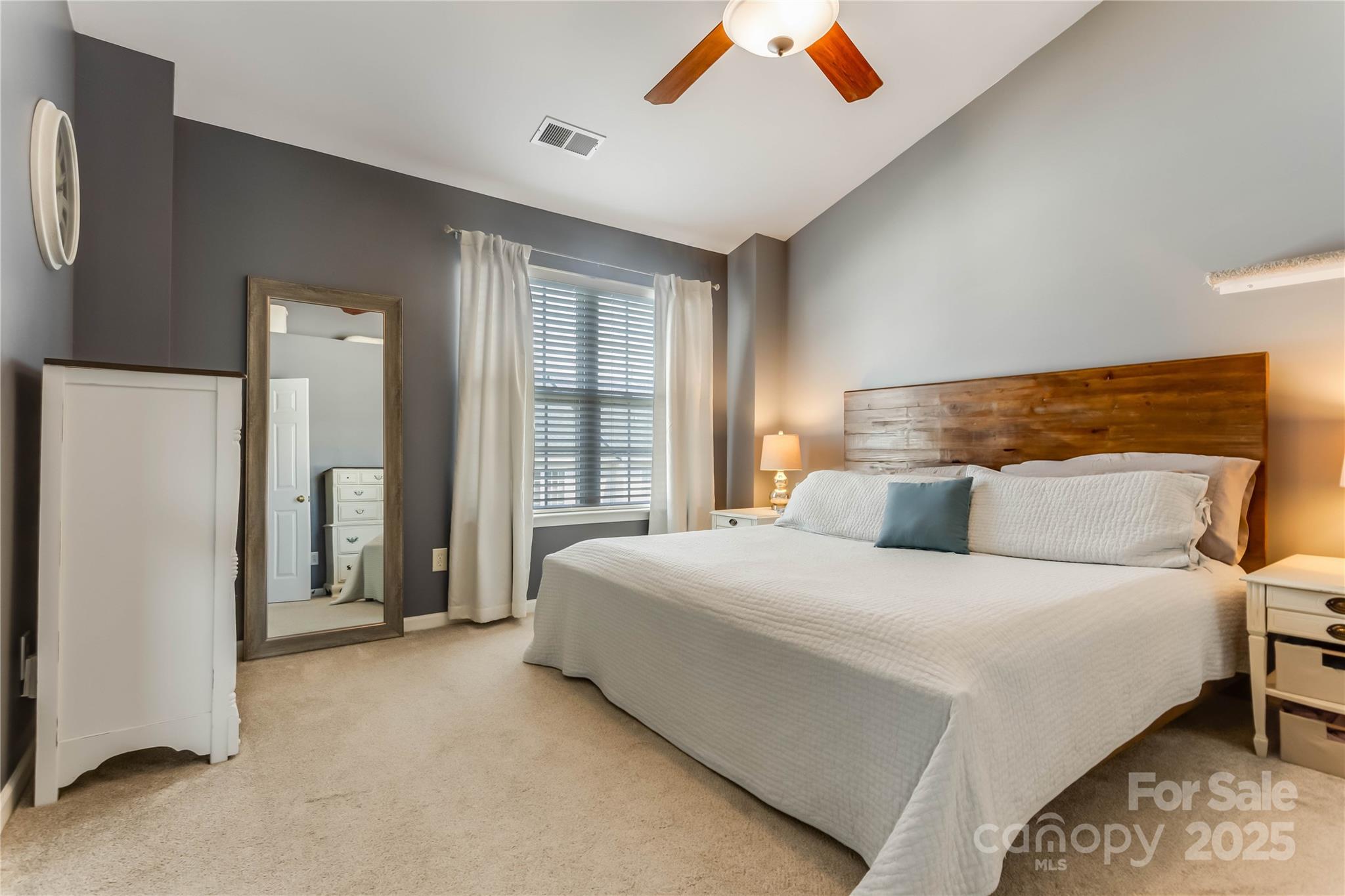 308 Rock Ridge Lane Mount Holly, NC 28120 - Photo 18 of 36 a bedroom with a bed and a window