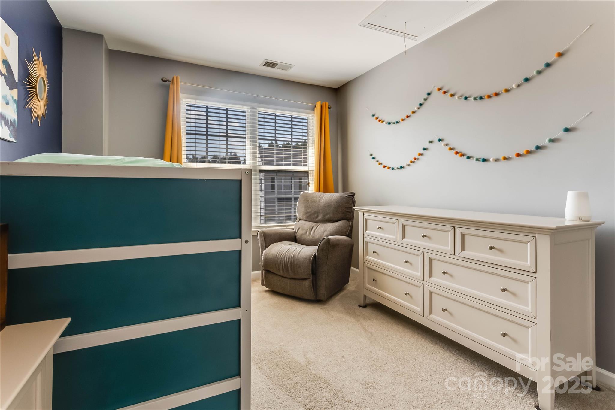 308 Rock Ridge Lane Mount Holly, NC 28120 - Photo 24 of 36 a bedroom with a bed and a window