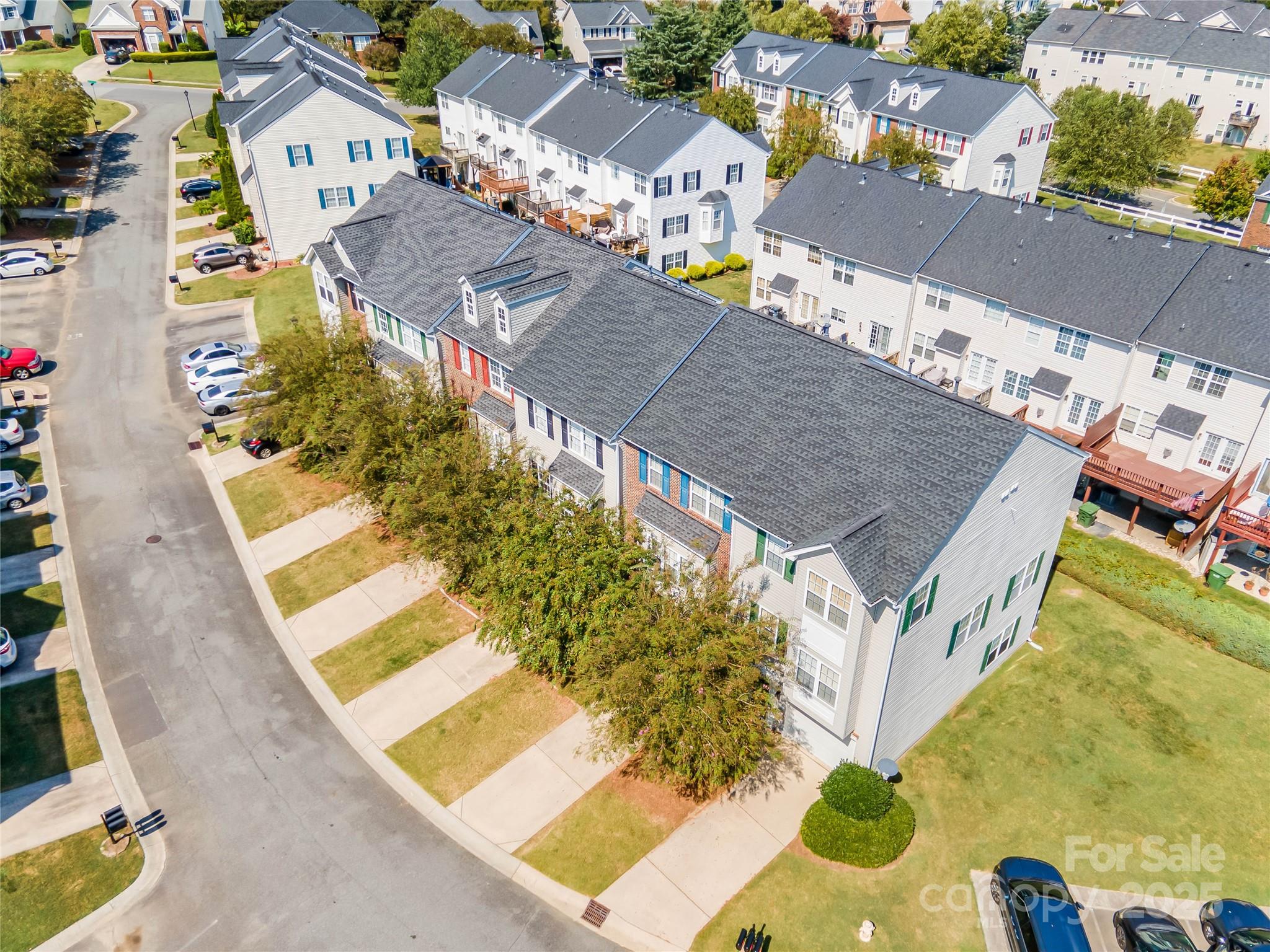 308 Rock Ridge Lane Mount Holly, NC 28120 - Photo 28 of 36 an aerial view of residential houses with outdoor space