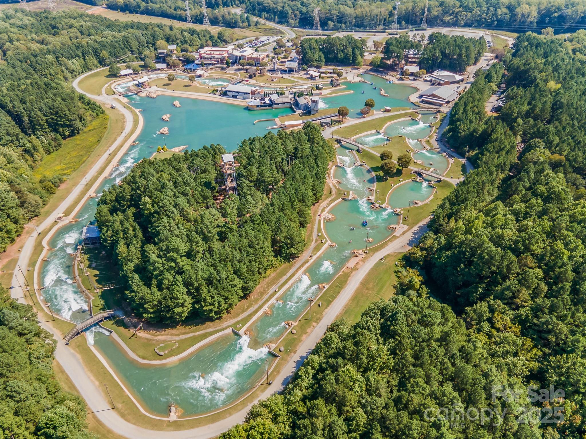 308 Rock Ridge Lane Mount Holly, NC 28120 - Photo 35 of 36 a view of a lake with a yard
