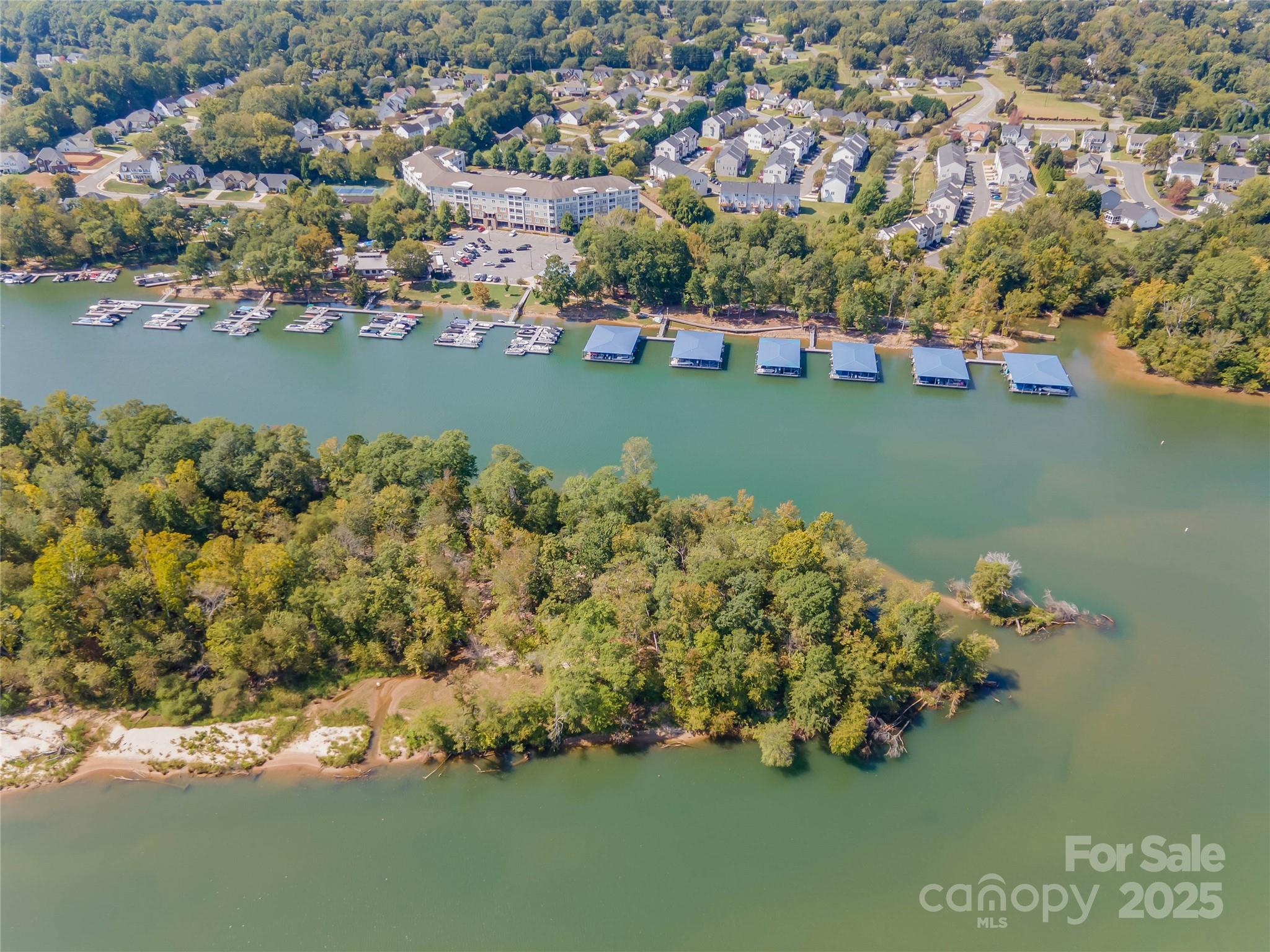 308 Rock Ridge Lane Mount Holly, NC 28120 - Photo 36 of 36 an aerial view of a house with a lake view
