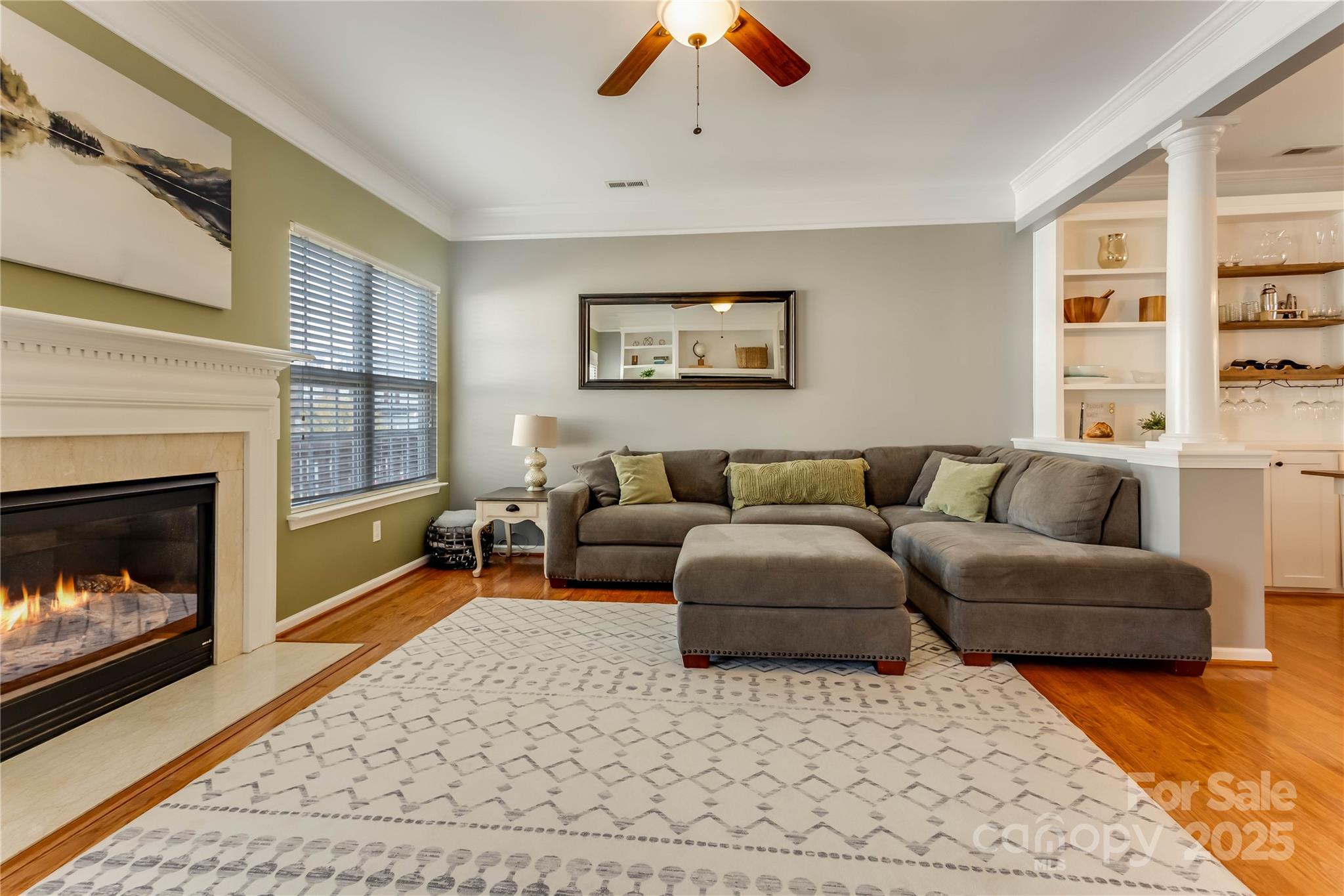 308 Rock Ridge Lane Mount Holly, NC 28120 - Photo 4 of 36 a living room with furniture and a fireplace