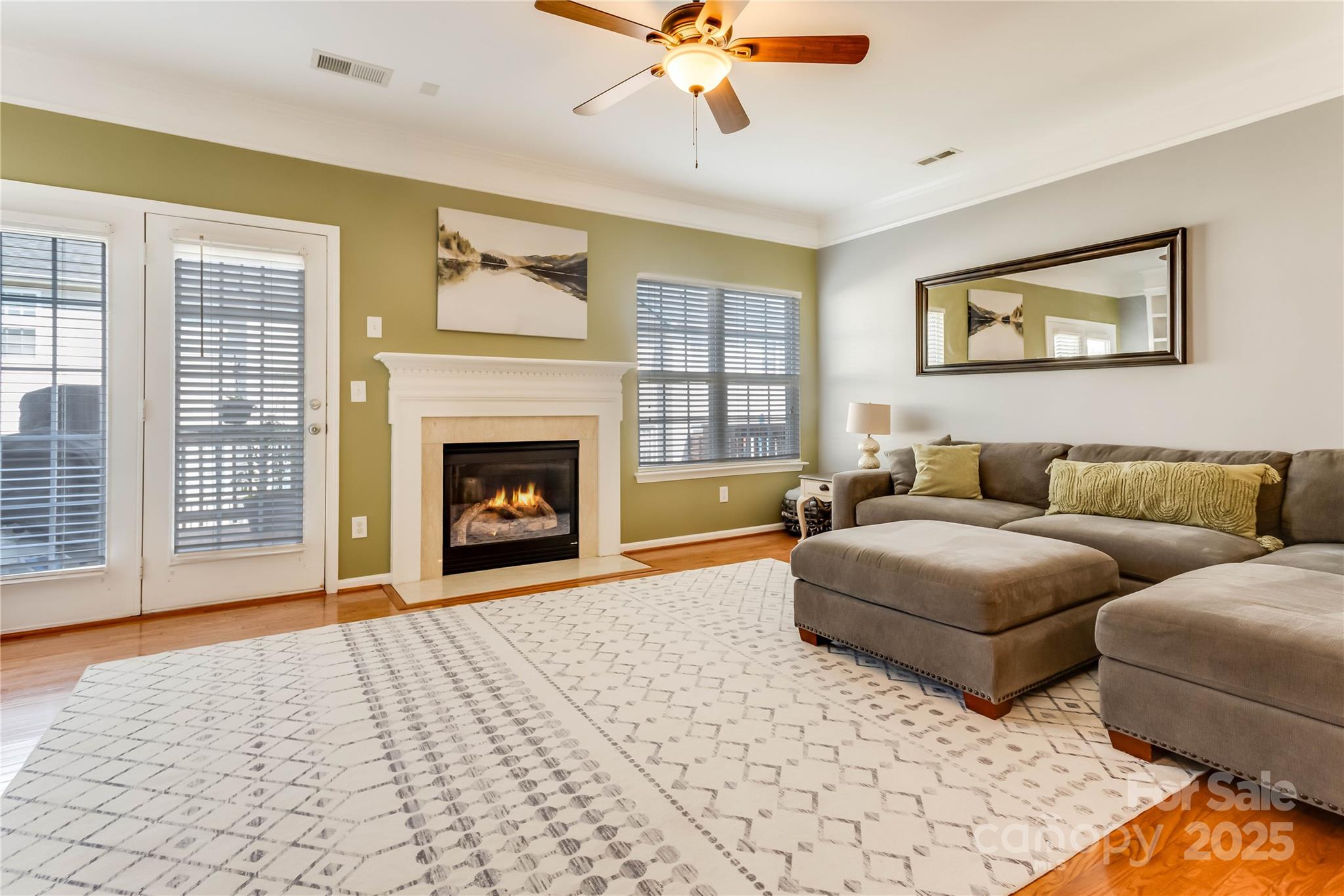 308 Rock Ridge Lane Mount Holly, NC 28120 - Photo 5 of 36 a living room with furniture and a fireplace