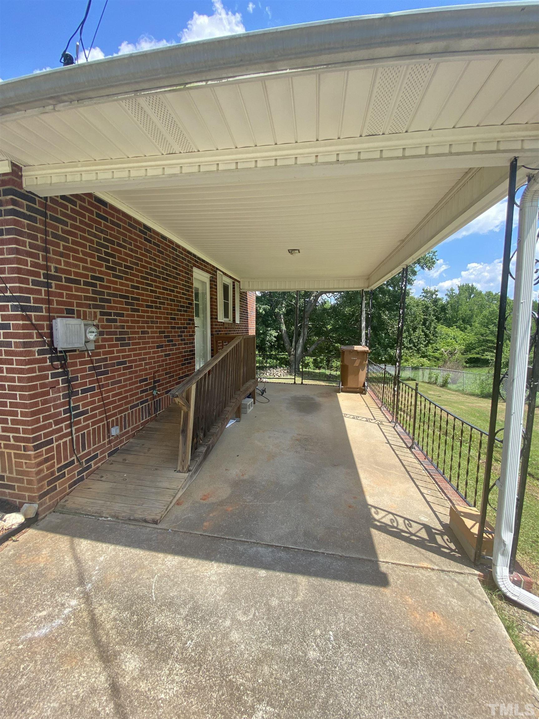 302 Allgood Street Roxboro, NC 27573 - Photo 3 of 30 a view of a balcony