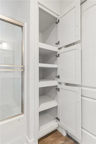 a view of an empty walk in closet