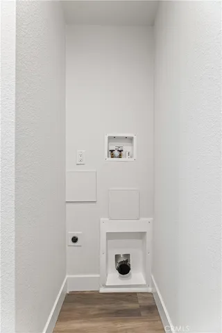 a view of a patio with couches and potted plants