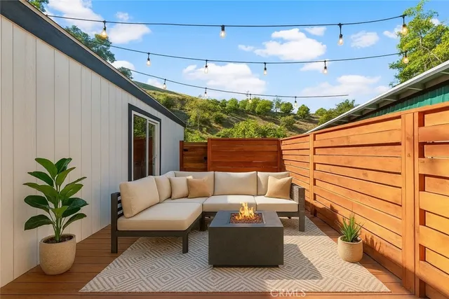 a balcony with wooden floor