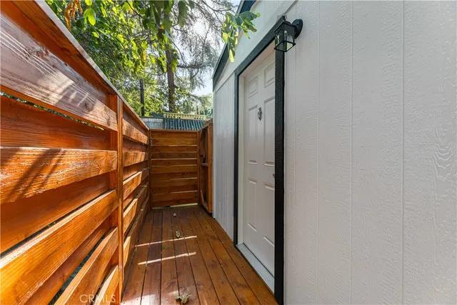 a backyard of a house with wooden floor