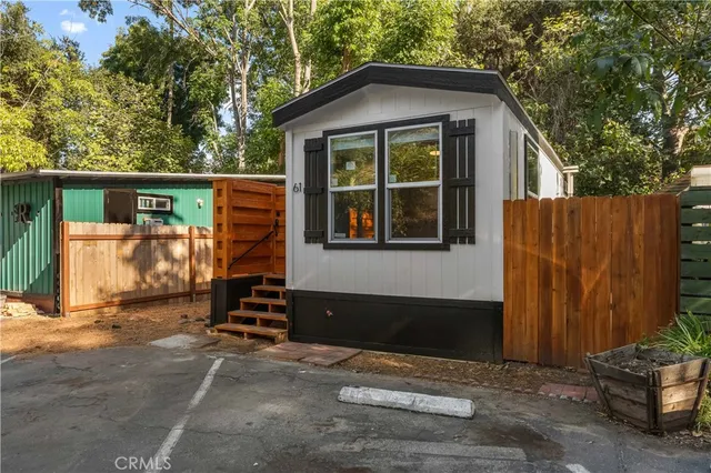a front view of a house with a garage