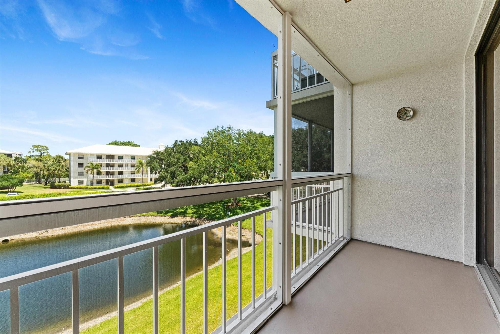 6217 Balboa Circle, Unit 305 Boca Raton, FL 33433 - Photo 24 of 28 Primary Bedroom Balcony