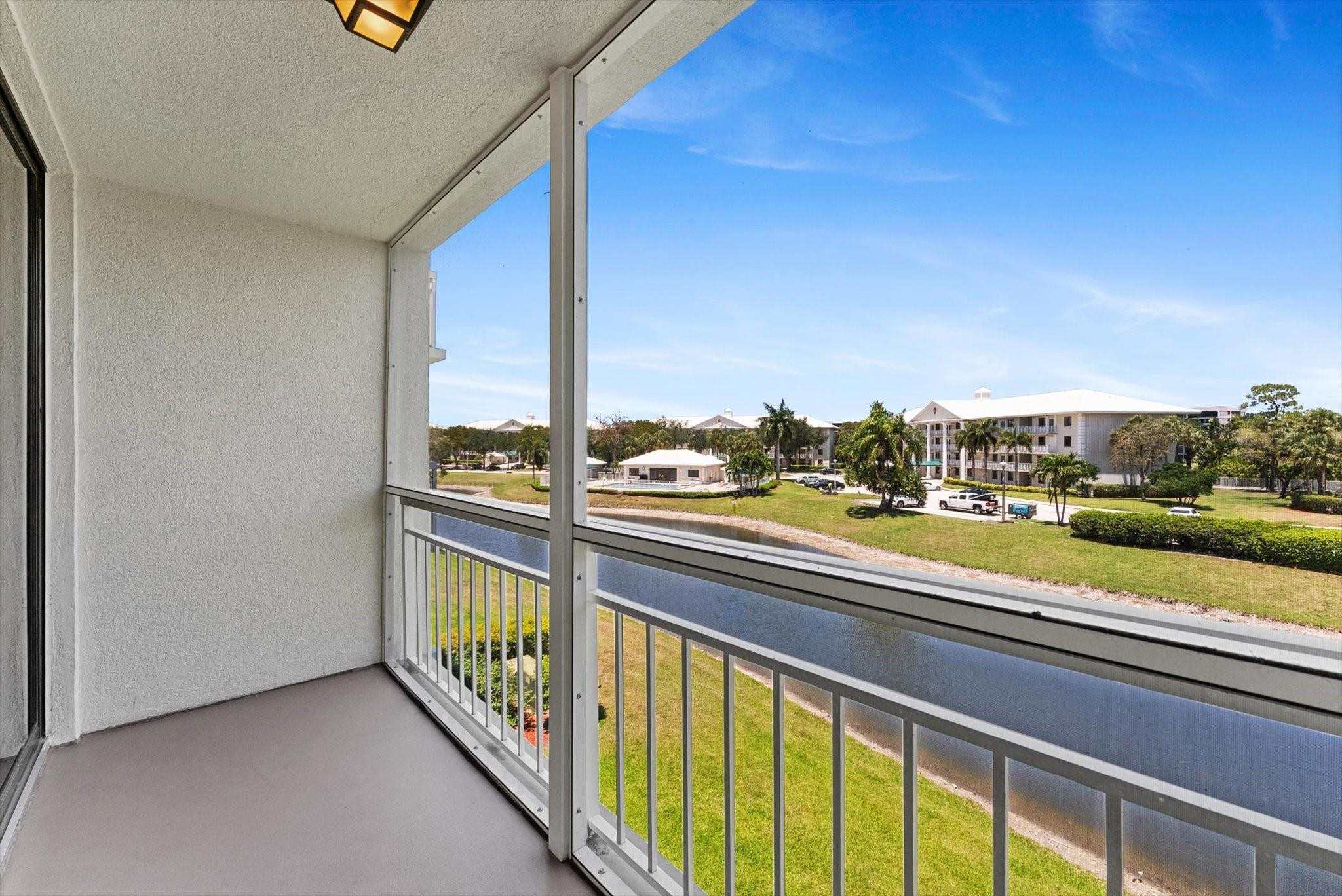 6217 Balboa Circle, Unit 305 Boca Raton, FL 33433 - Photo 25 of 28 Primary Bedroom Balcony