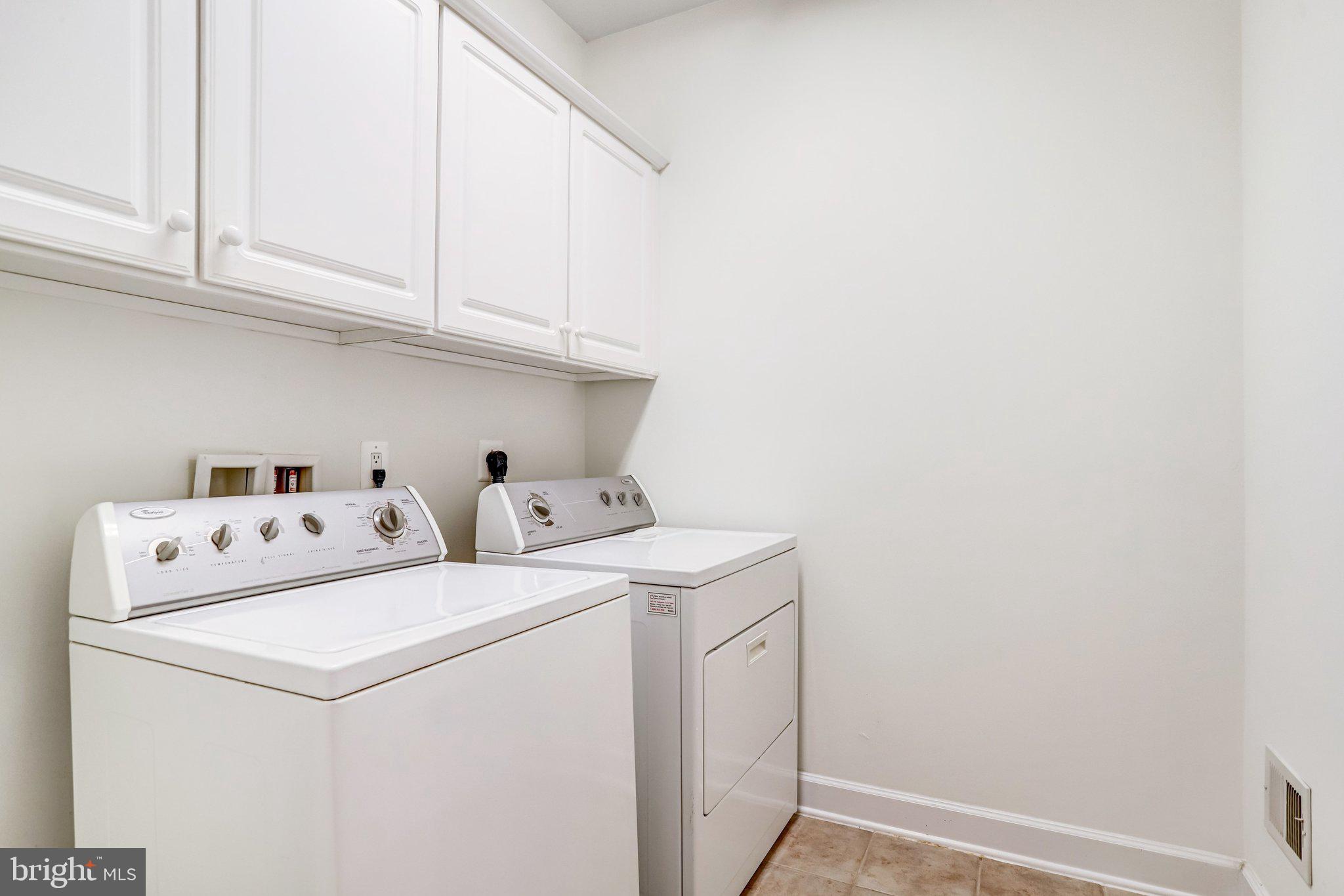 44406 Adare Manor Square Ashburn, VA 20147 - Photo 25 of 58 Laundry Room with Built-in Cabinets
