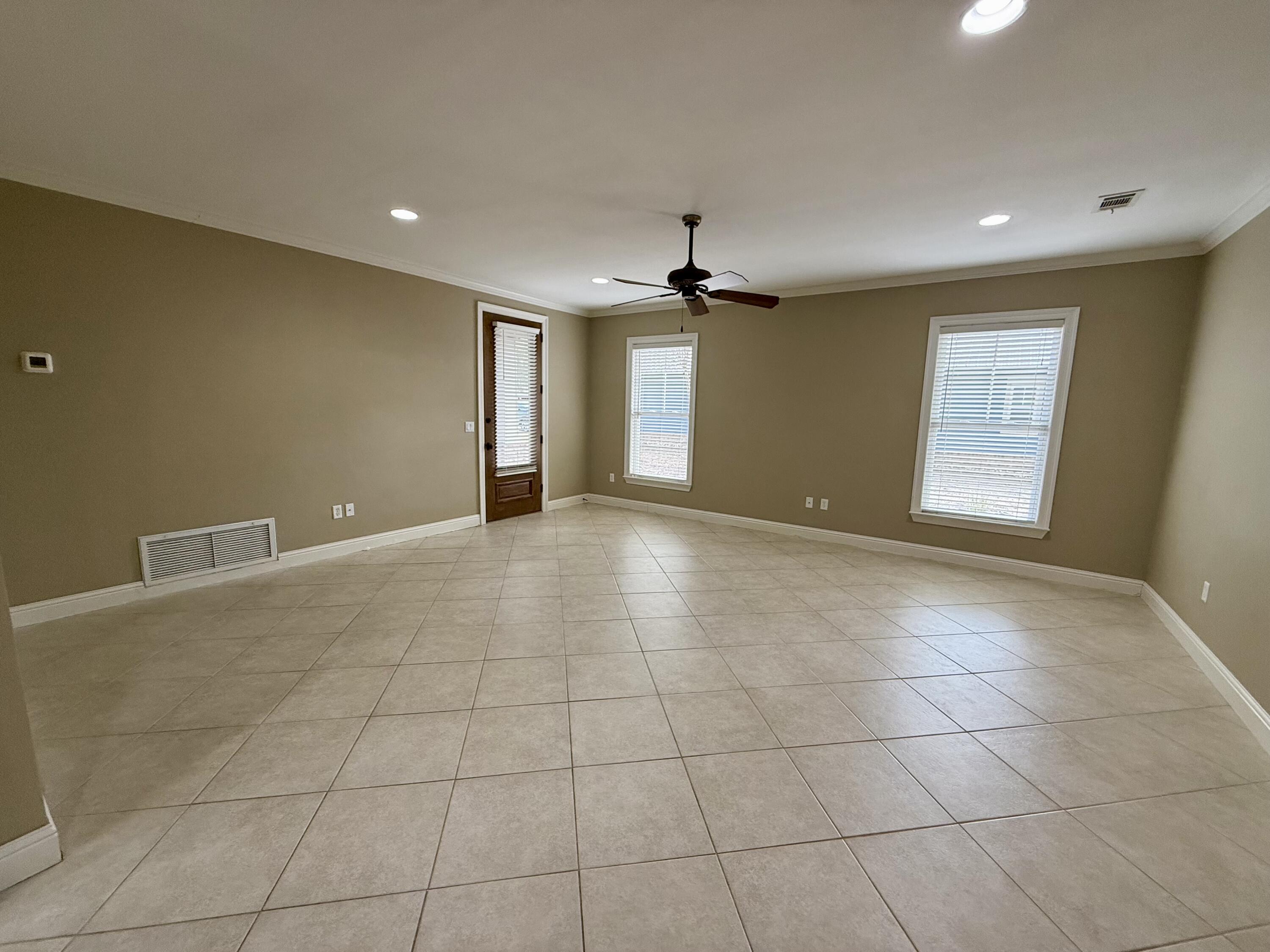 70 Jakes Way Freeport, FL 32439 - Photo 2 of 9 a view of an empty room with a window