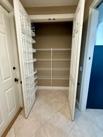 a view of wooden door in a house
