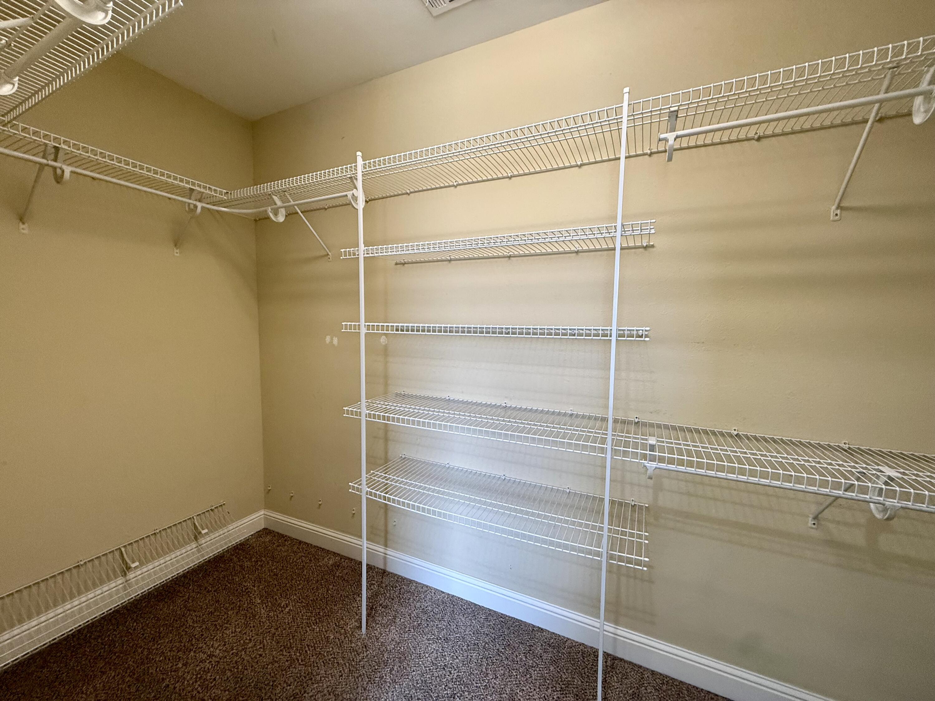 70 Jakes Way Freeport, FL 32439 - Photo 6 of 9 a view of an empty walk in closet
