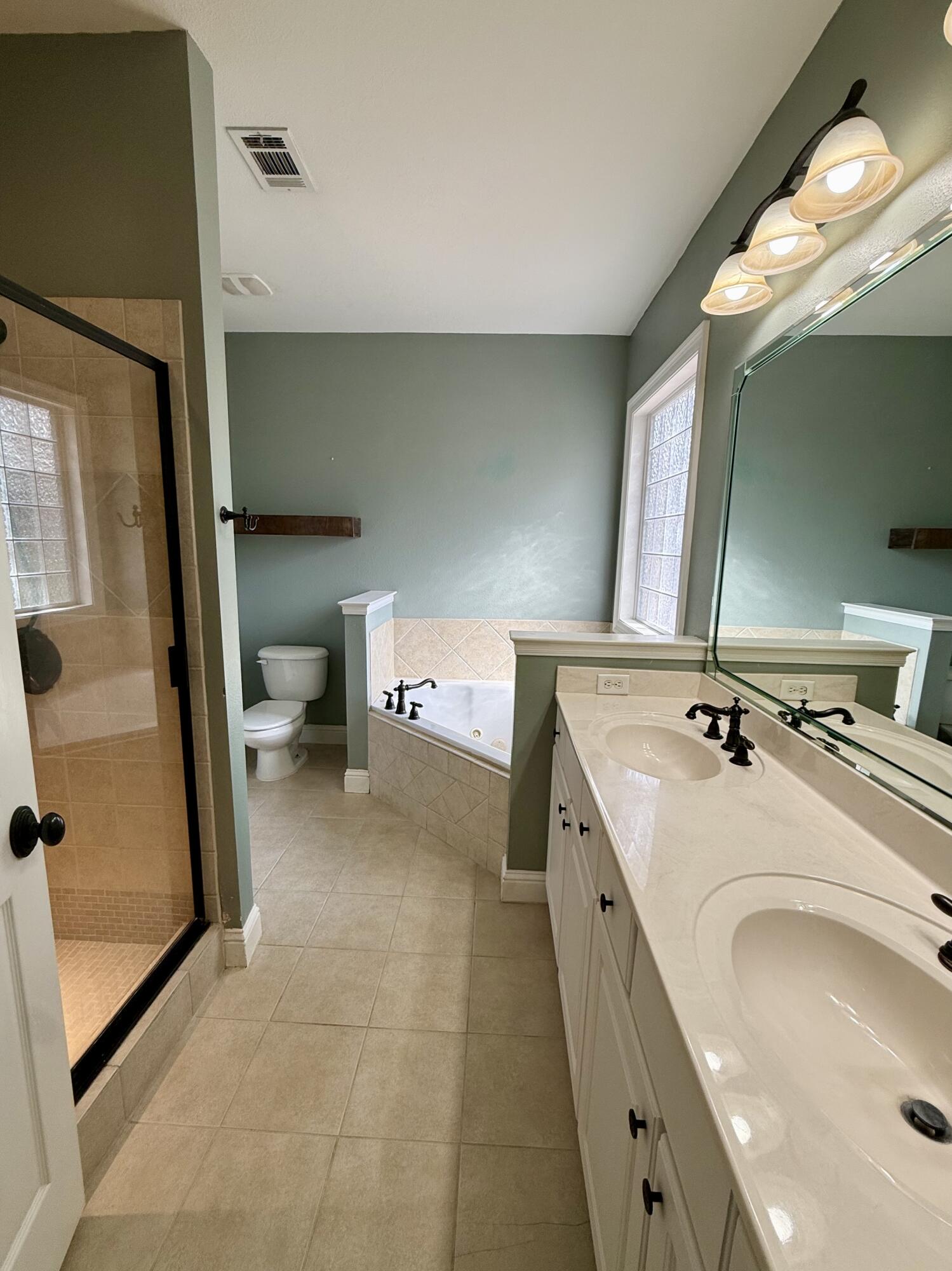 70 Jakes Way Freeport, FL 32439 - Photo 7 of 9 a bathroom with a sink and mirror