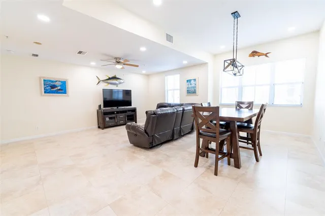 a view of kitchen and dining area with furniture