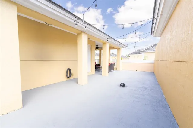 a view of a street with a building in the background