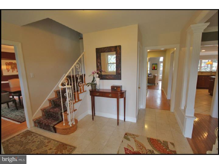 1028 Millbrook Road Berwyn, PA 19312 - Photo 2 of 25 a view of entryway and hall with wooden floor