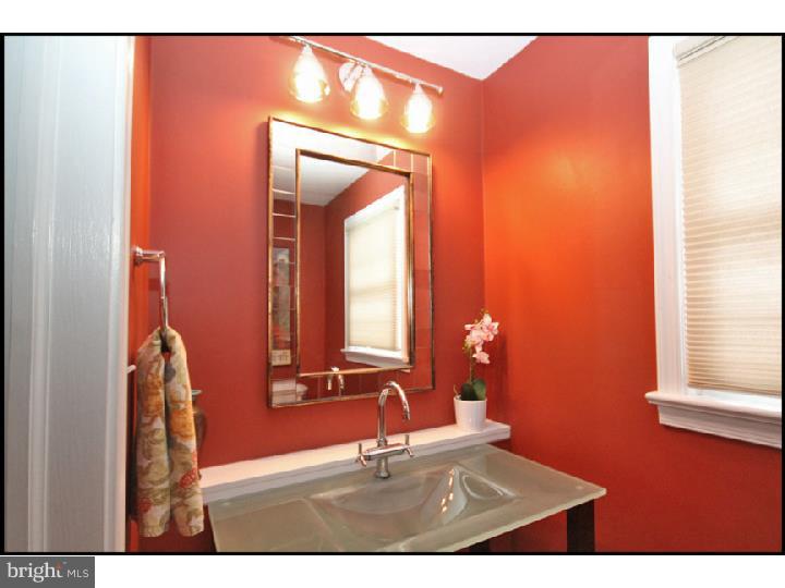 1028 Millbrook Road Berwyn, PA 19312 - Photo 11 of 25 a bathroom with a sink and a mirror