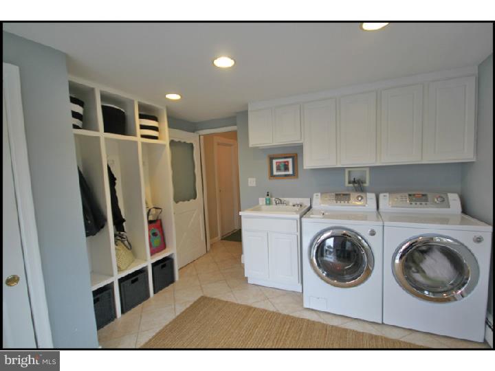 1028 Millbrook Road Berwyn, PA 19312 - Photo 12 of 25 a utility room with dryer and washer