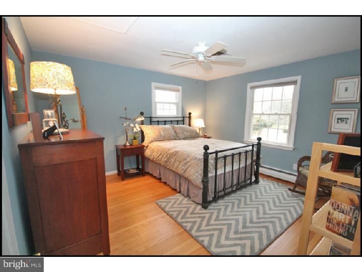 1028 Millbrook Road Berwyn, PA 19312 - Photo 18 of 25 a bedroom with a bed and window