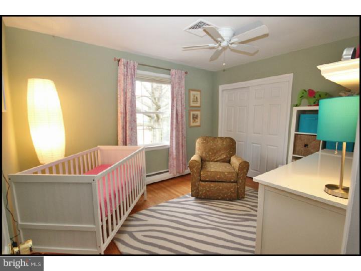 1028 Millbrook Road Berwyn, PA 19312 - Photo 20 of 25 a living room with furniture and a window