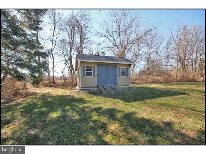 1028 Millbrook Road Berwyn, PA 19312 - Photo 24 of 25 a view of a house with a yard