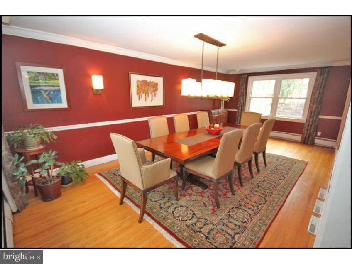1028 Millbrook Road Berwyn, PA 19312 - Photo 4 of 25 a view of a dining room with furniture and wooden floor