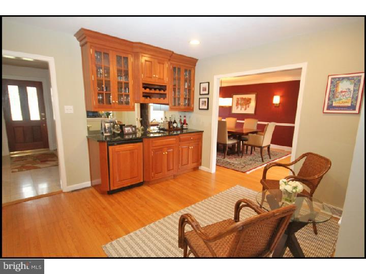 1028 Millbrook Road Berwyn, PA 19312 - Photo 6 of 25 a view of a livingroom with furniture wooden floor and windows