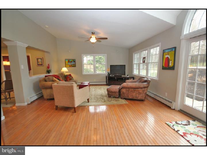 1028 Millbrook Road Berwyn, PA 19312 - Photo 10 of 25 a living room with furniture and a wooden floor