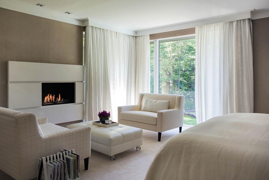 63 Westcliff Road Weston, MA 02493 - Photo 17 of 30 a bedroom with a bed a couch and a window